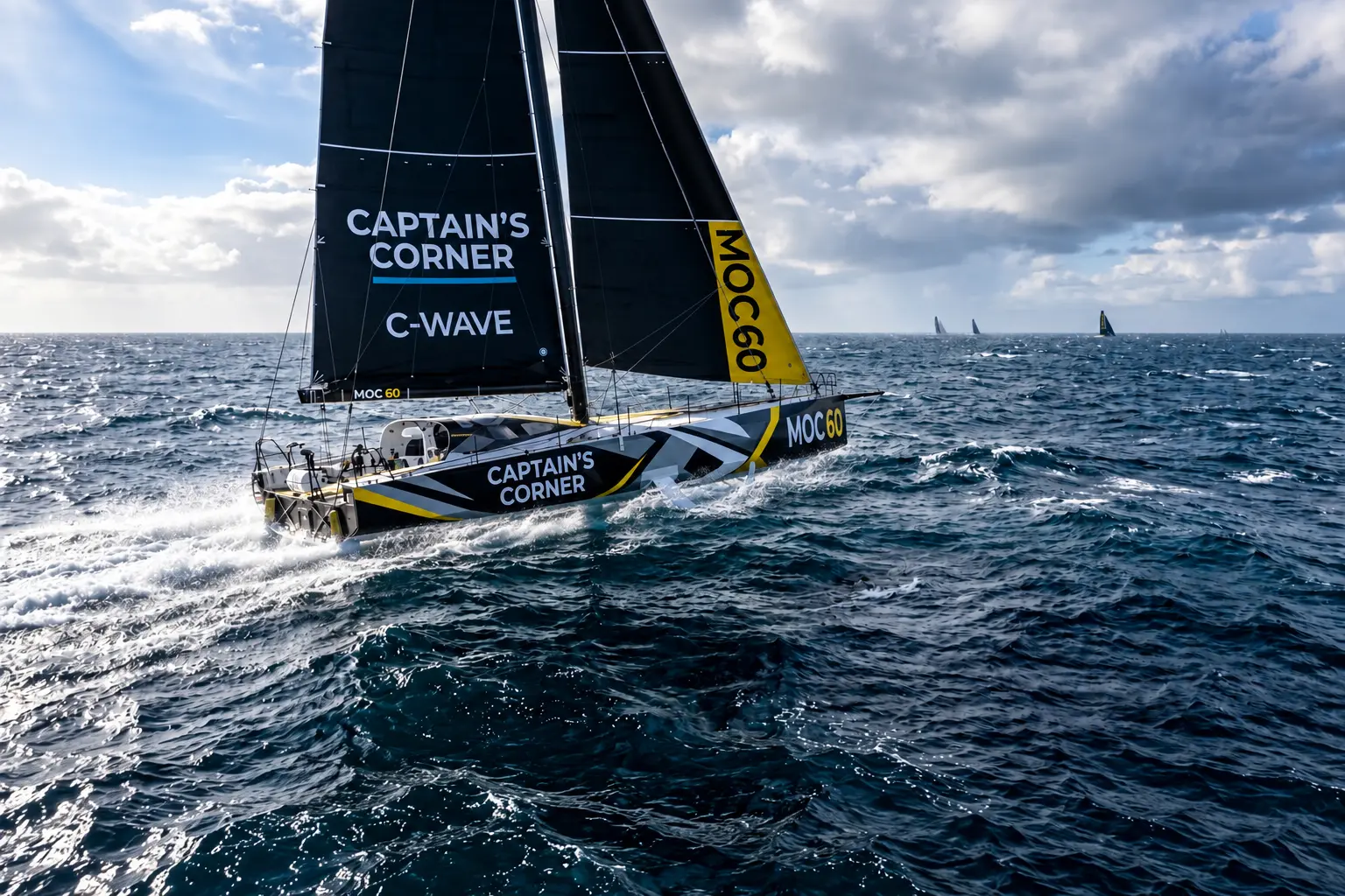 Captain's Corner racing sailboat heeling over in a swell